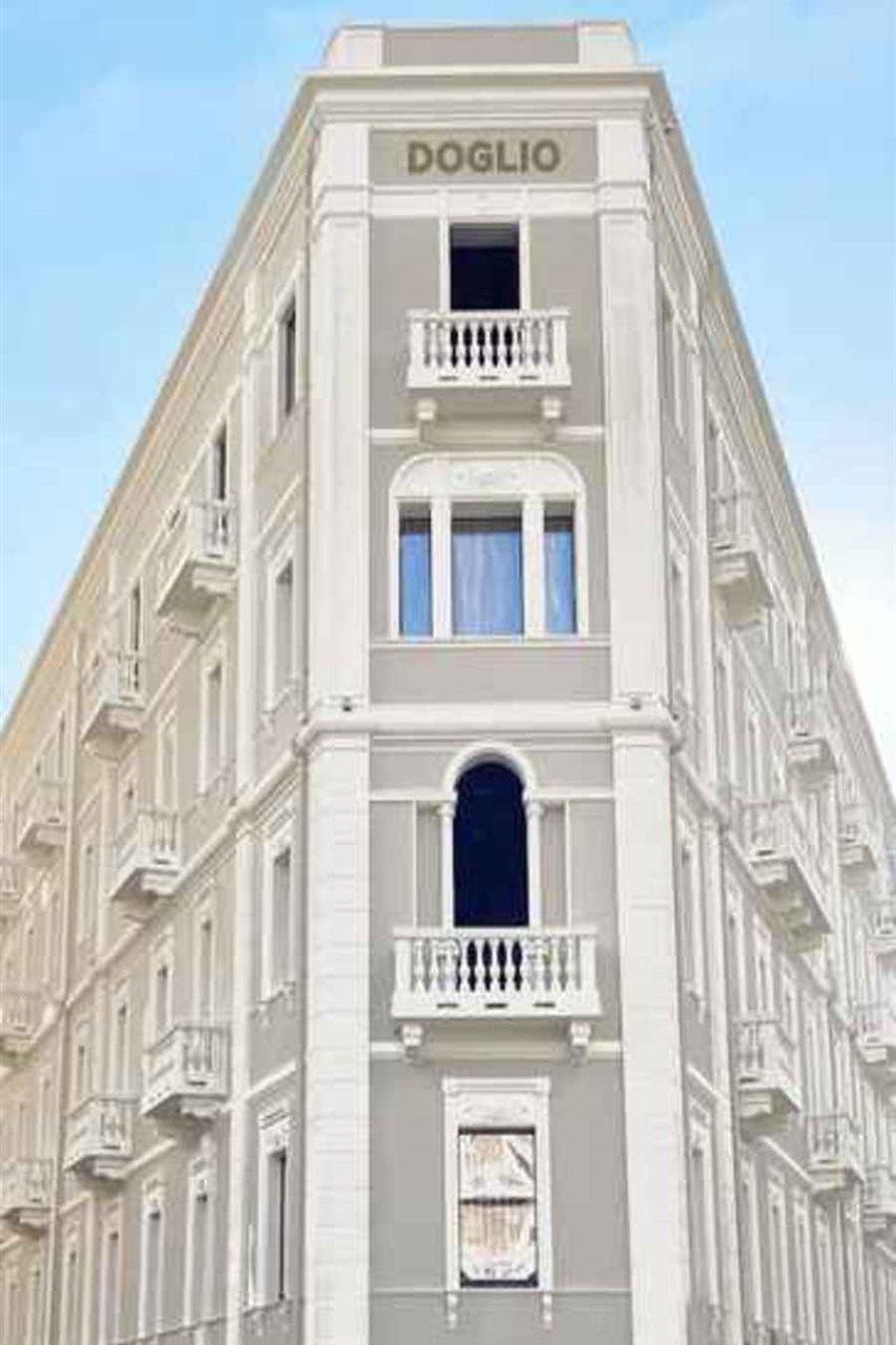 Palazzo Doglio Hotel Cagliari Luaran gambar The facade of the building