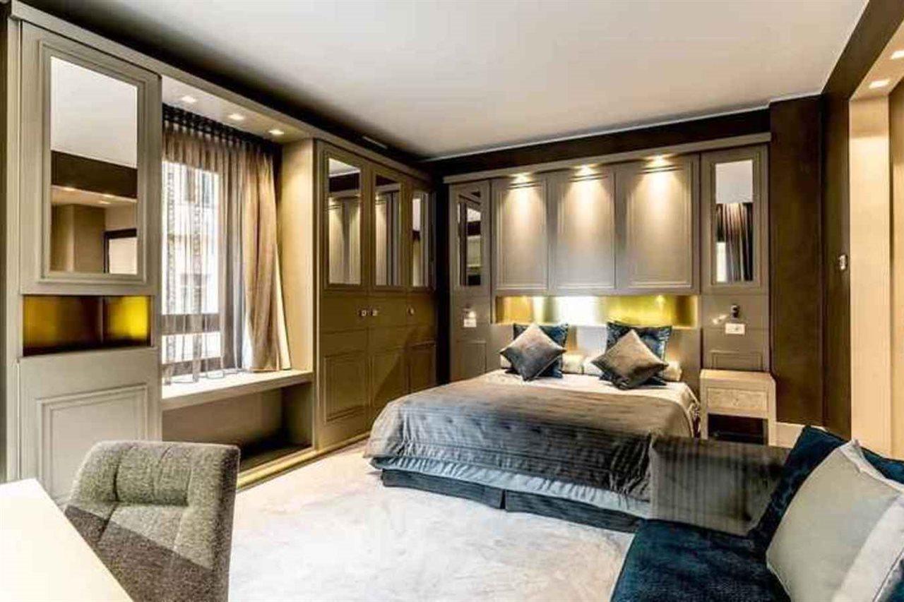 Palazzo Doglio Hotel Cagliari Luaran gambar A bedroom