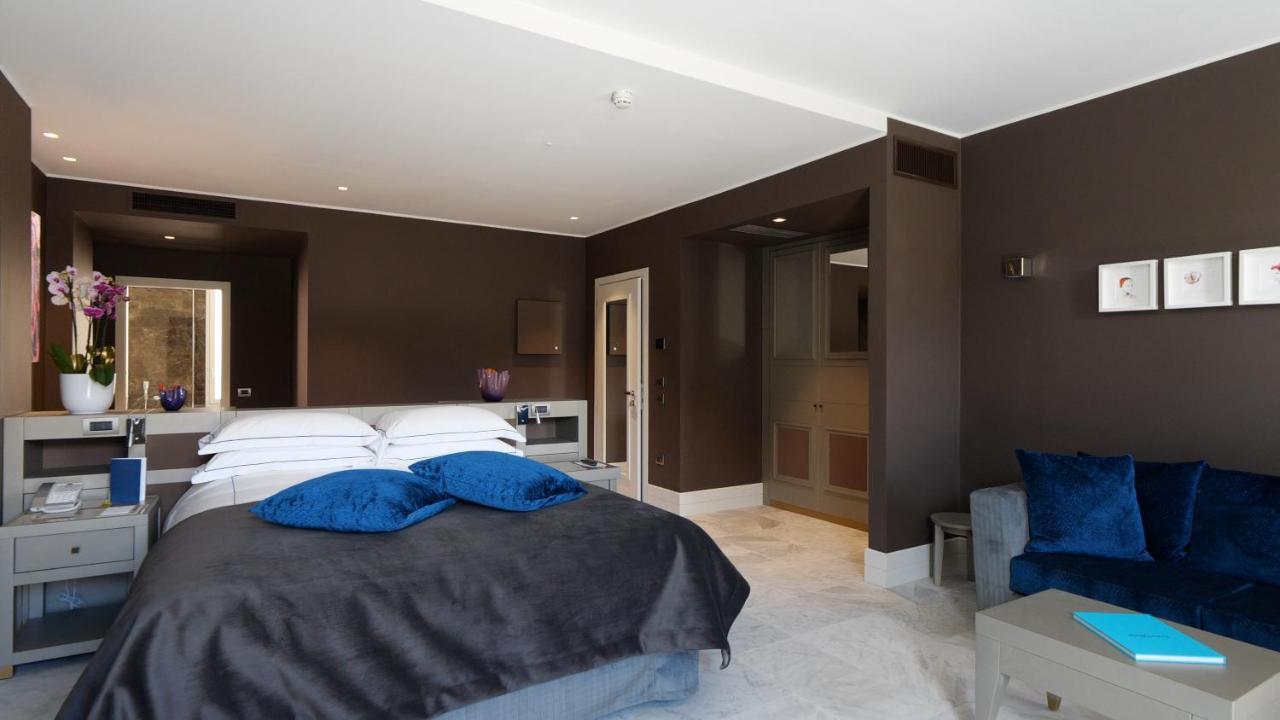 Palazzo Doglio Hotel Cagliari Luaran gambar A bedroom at the hotel