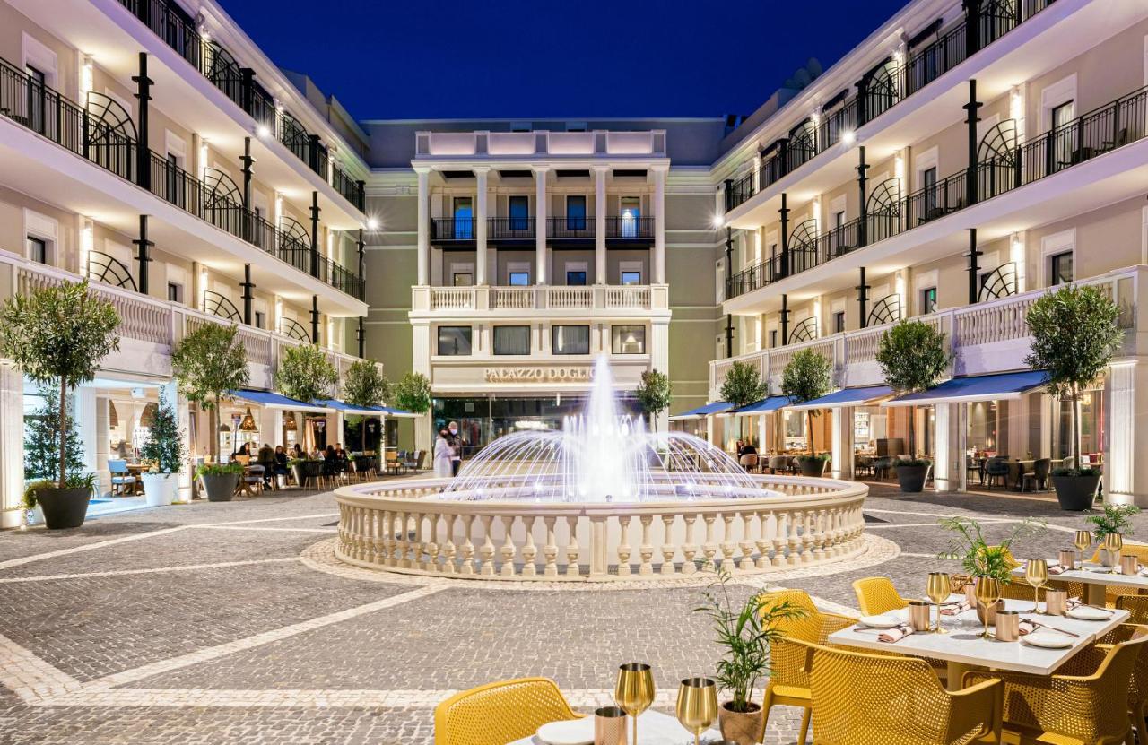 Palazzo Doglio Hotel Cagliari Luaran gambar The Hotel's courtyard