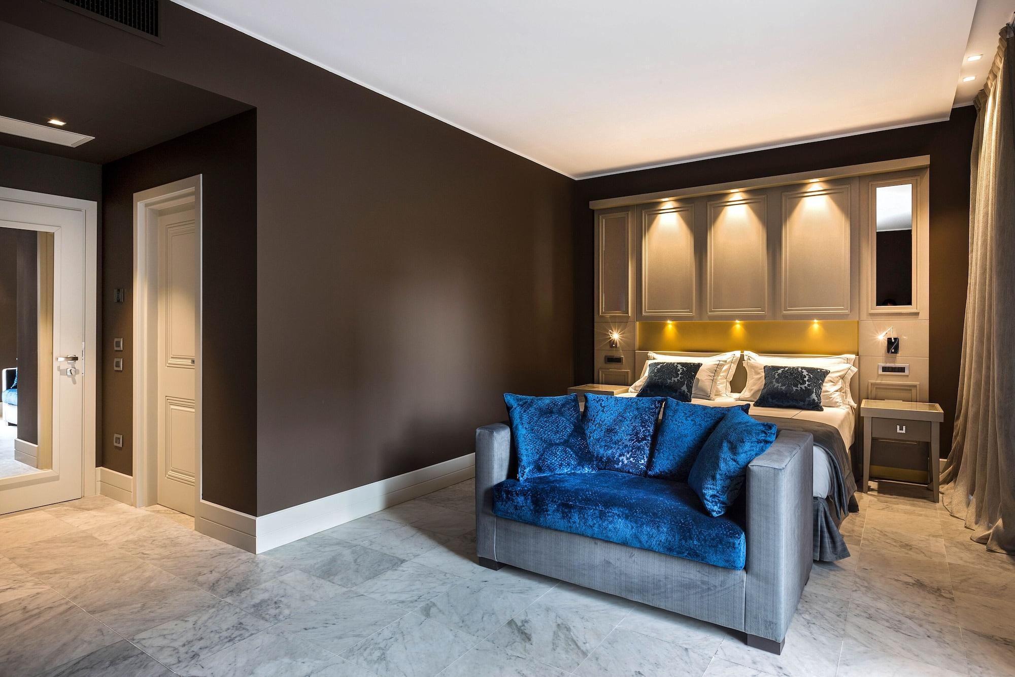 Palazzo Doglio Hotel Cagliari Luaran gambar A room at the hotel