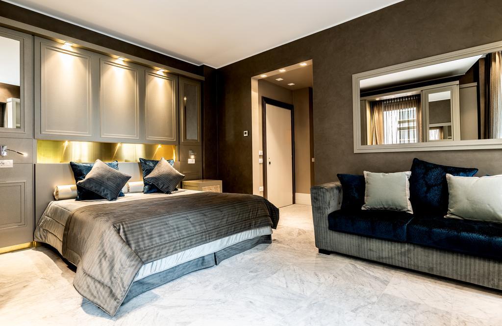 Palazzo Doglio Hotel Cagliari Luaran gambar A bedroom